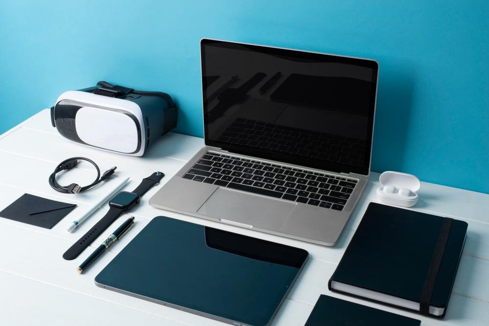 laptop, watch, tablet , on the table