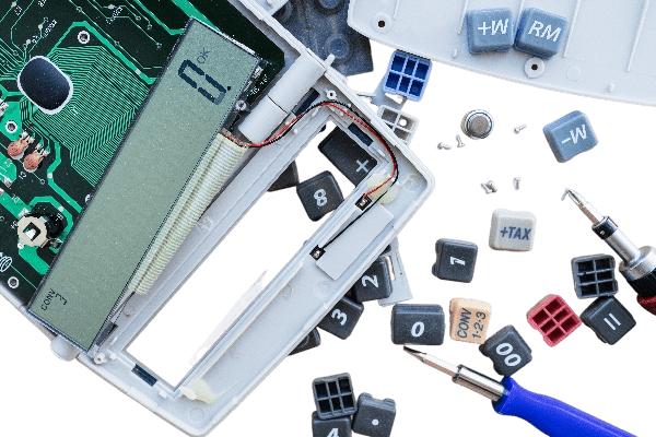 Disassembled calculator with exposed circuit board