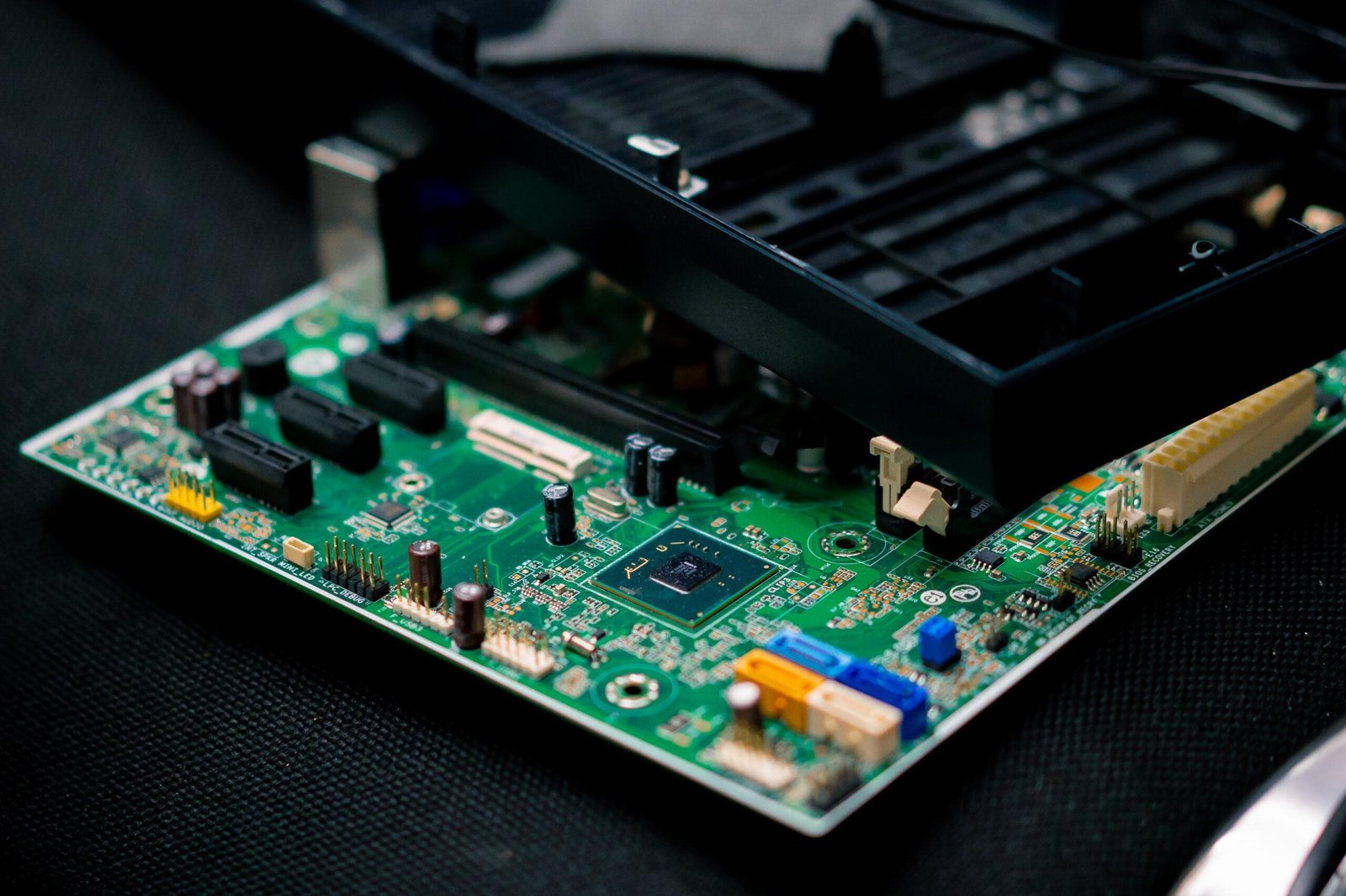 green Electronic system computer motherboard digital chip with transistor chip technology close-up