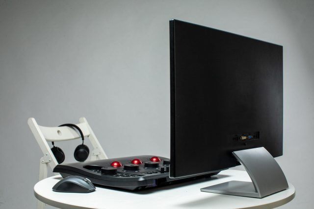 Desktop monitor with control panel and mouse